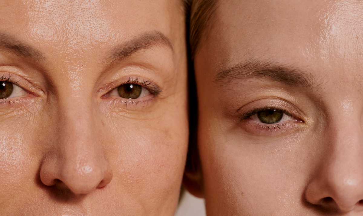 Women treating their skin with red light therapy for radiant results